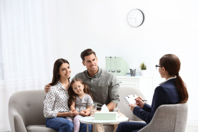 family and psychiatrist smiling