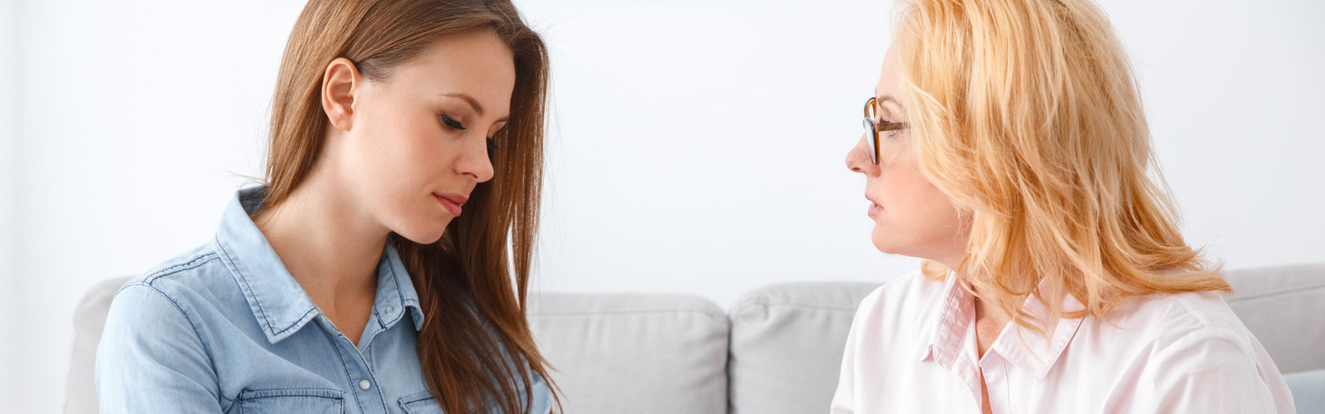 psychiatrist and woman having a session therapy